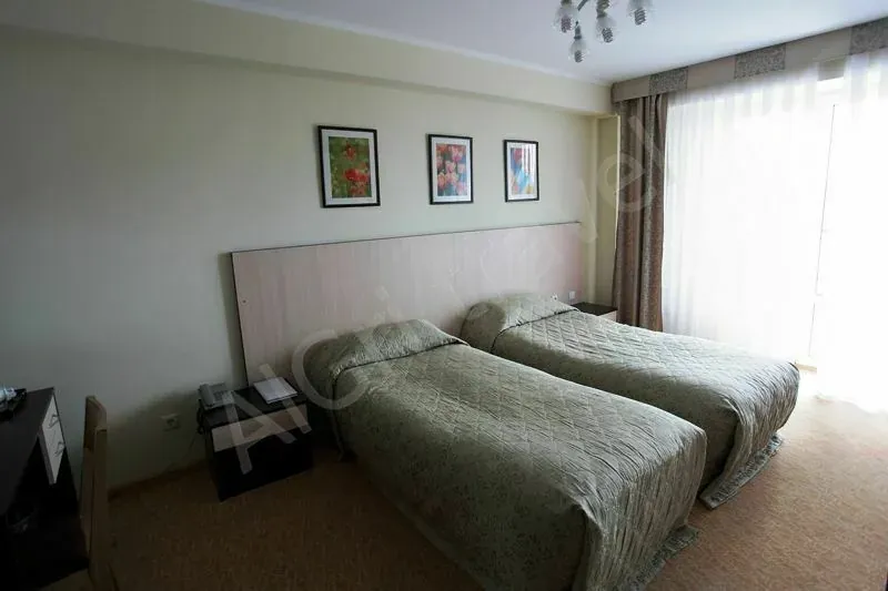 Номер Twin room в отеле Каприз Иссык-Куль