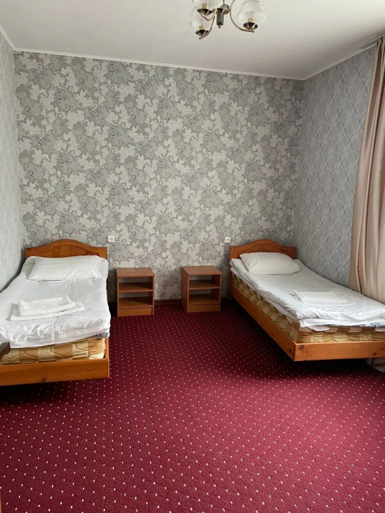 Первая спальня в коттедже Бриз - пансионат Колумб